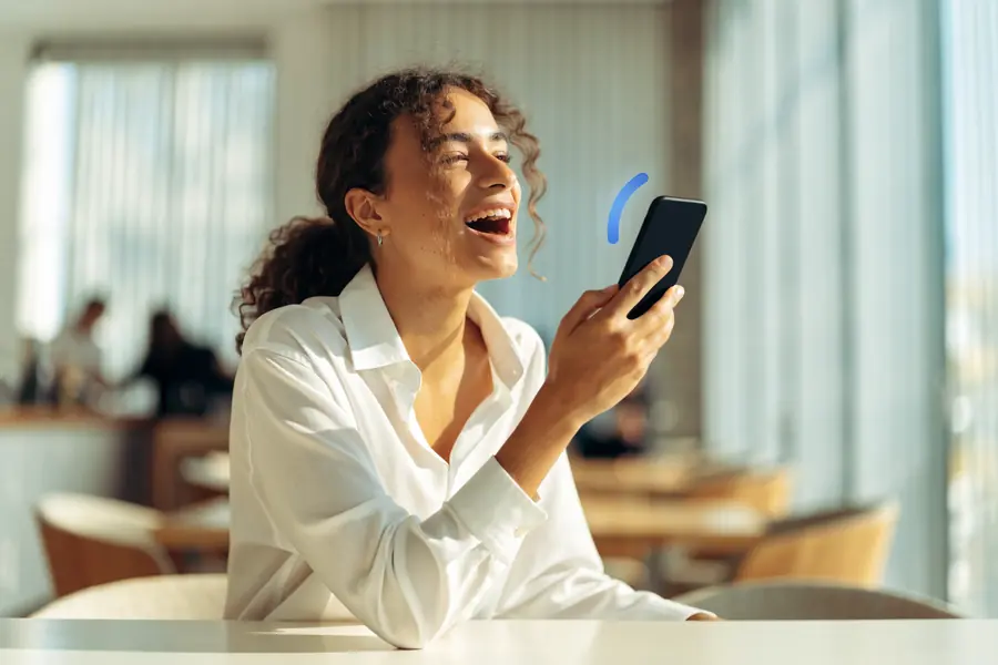 A person using voice search on their phone to find a nearby business