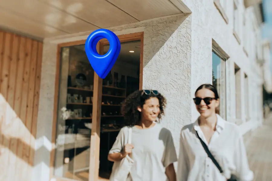 Happy customers arriving at a local storefront found via a map pin